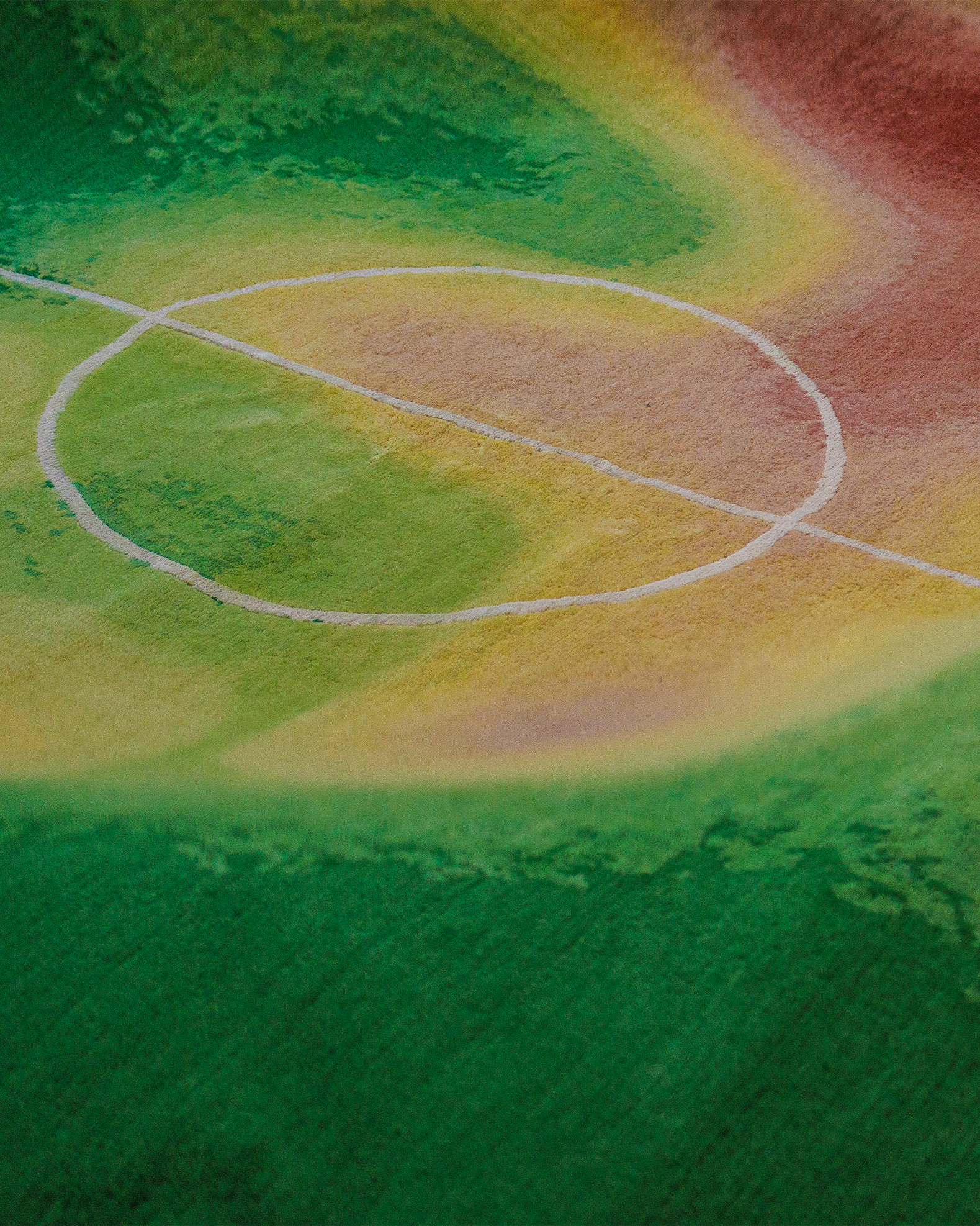 Close view of the hand knotted center circle and heat map color transitions